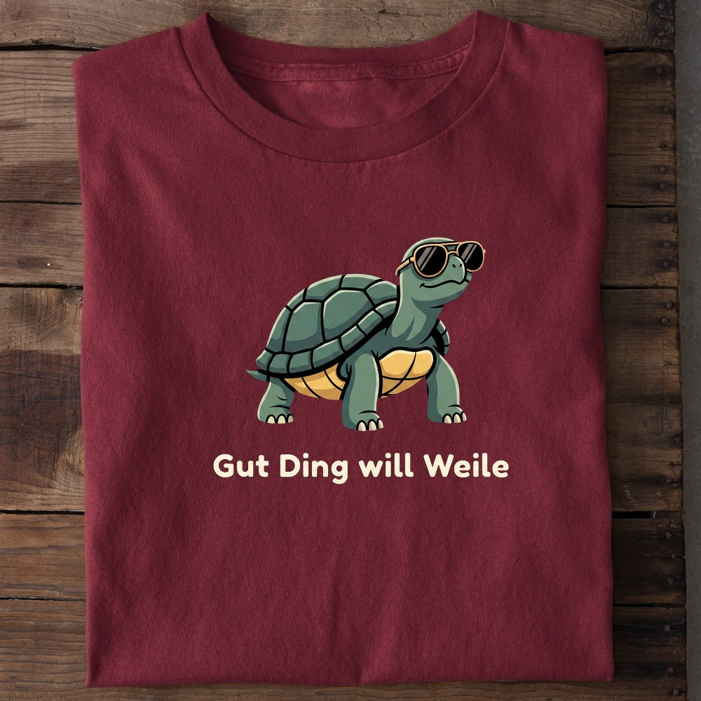 Unisex Bio-T-Shirt von Beyond Humor mit einer gemütlichen Schildkröte und dem Spruch 'Gut Ding will Weile'