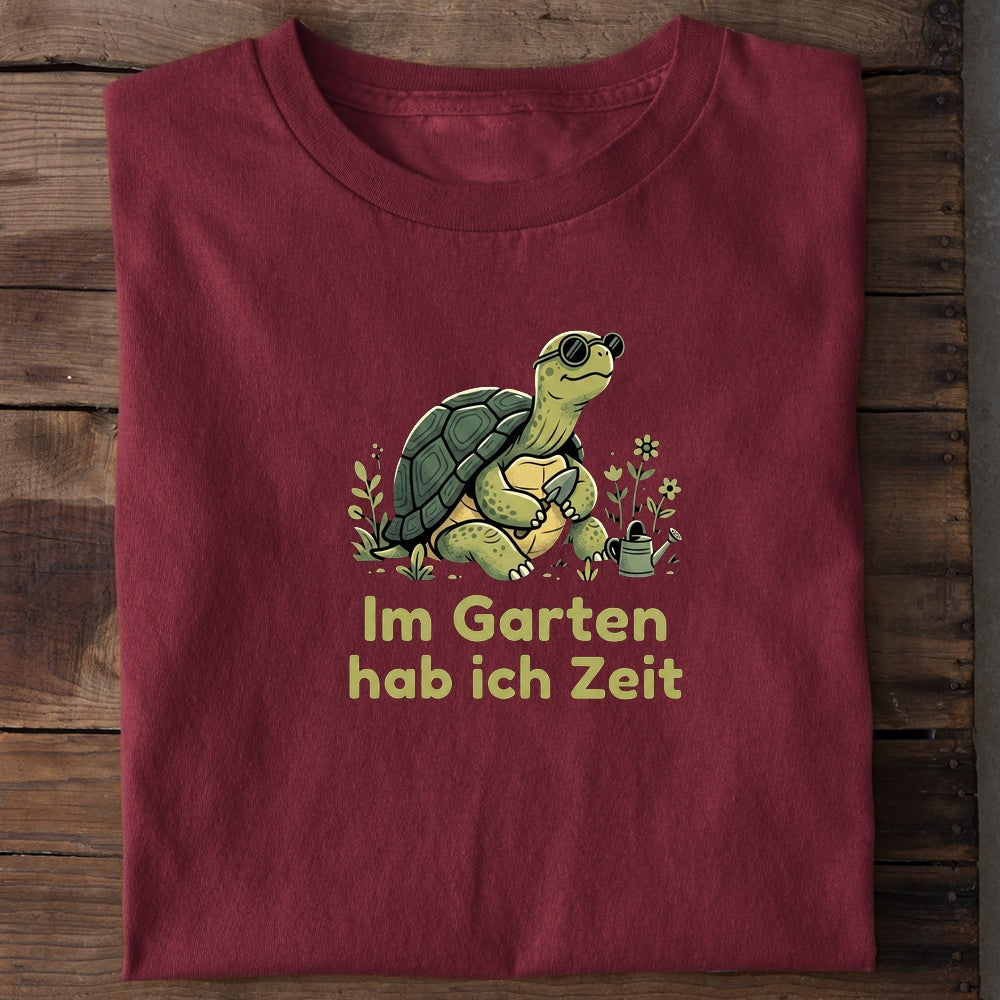 Unisex Bio-T-Shirt von Beyond Humor mit gemütlicher Schildkröte und dem Spruch 'Im Garten'