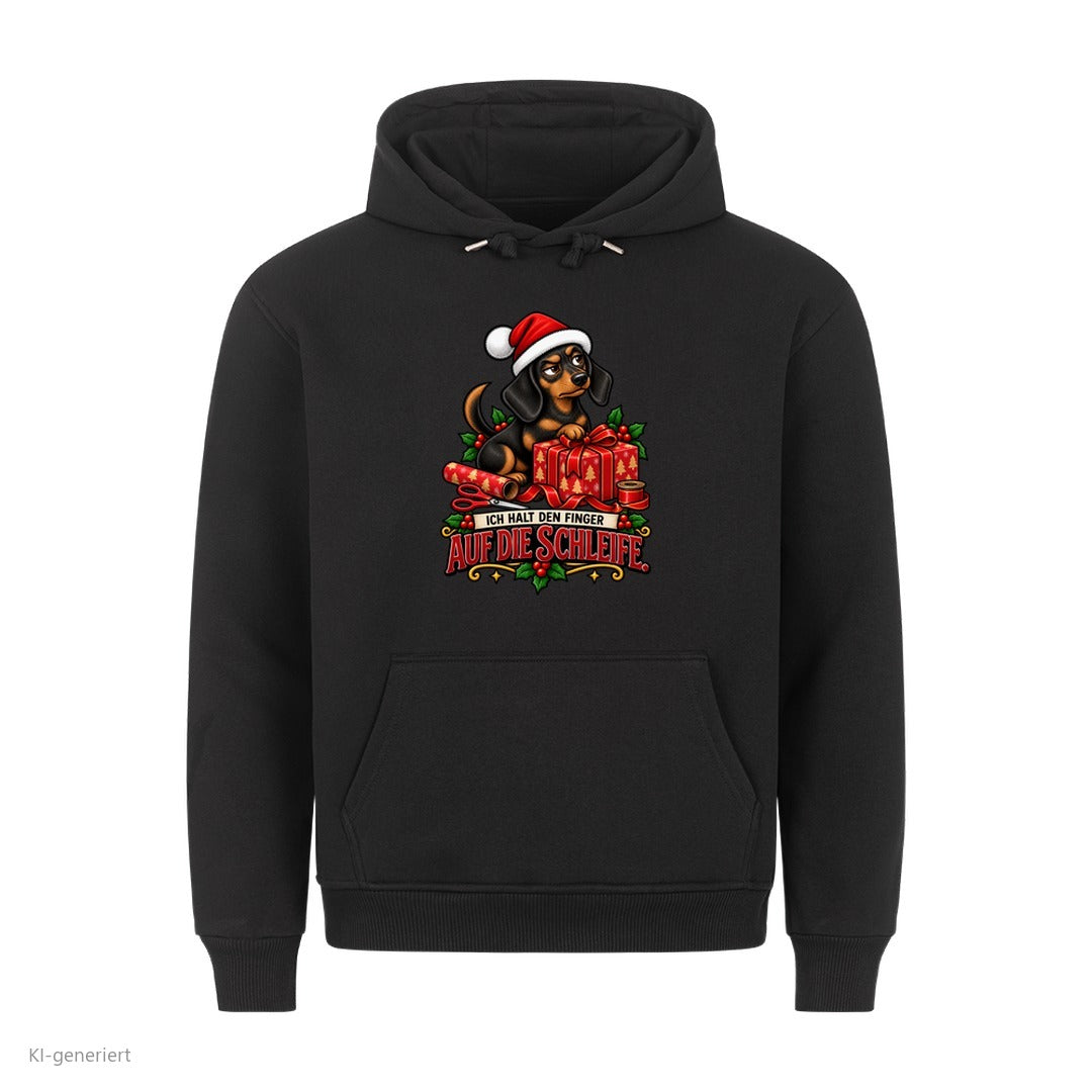 Partner Weihnachtshoodies Dackel: Ich halt den Finger auf die Schleife - Hoodie in Schwarz